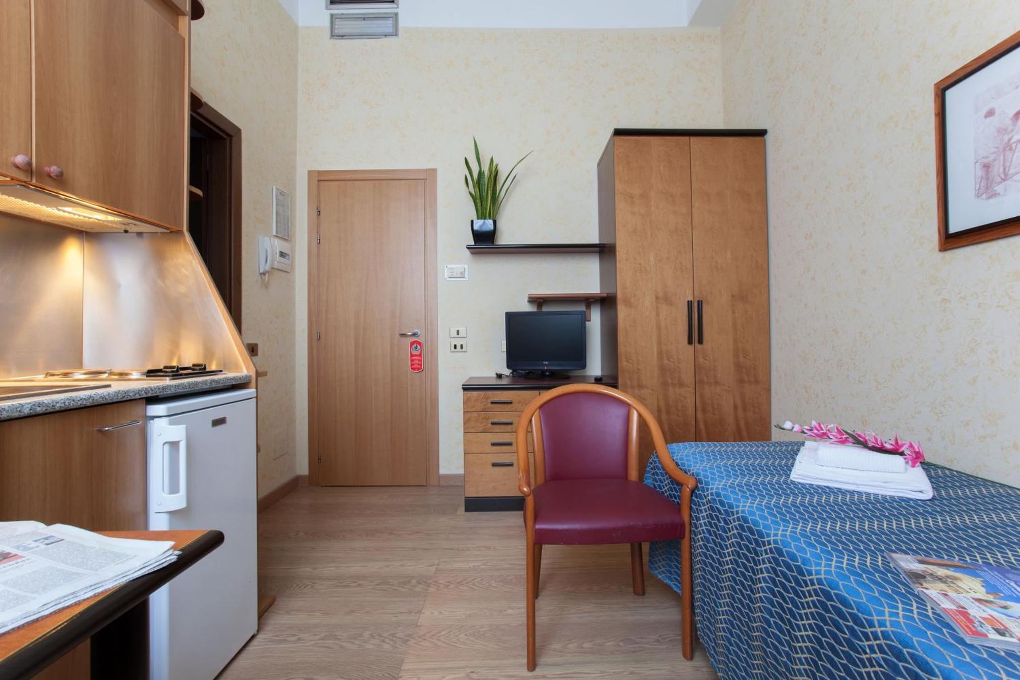 Habitación Individual con zona de cocina
